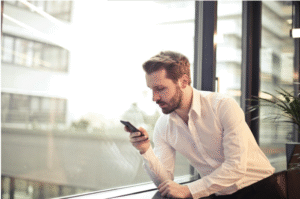 Man Looking at Phone