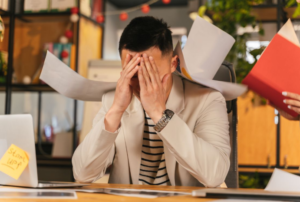 Man with Hands on Head