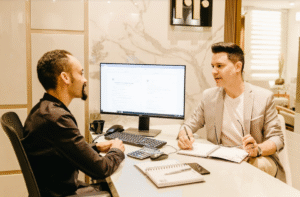 Men meeting at a desk
